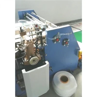Máquina de costura e corte com costura dupla